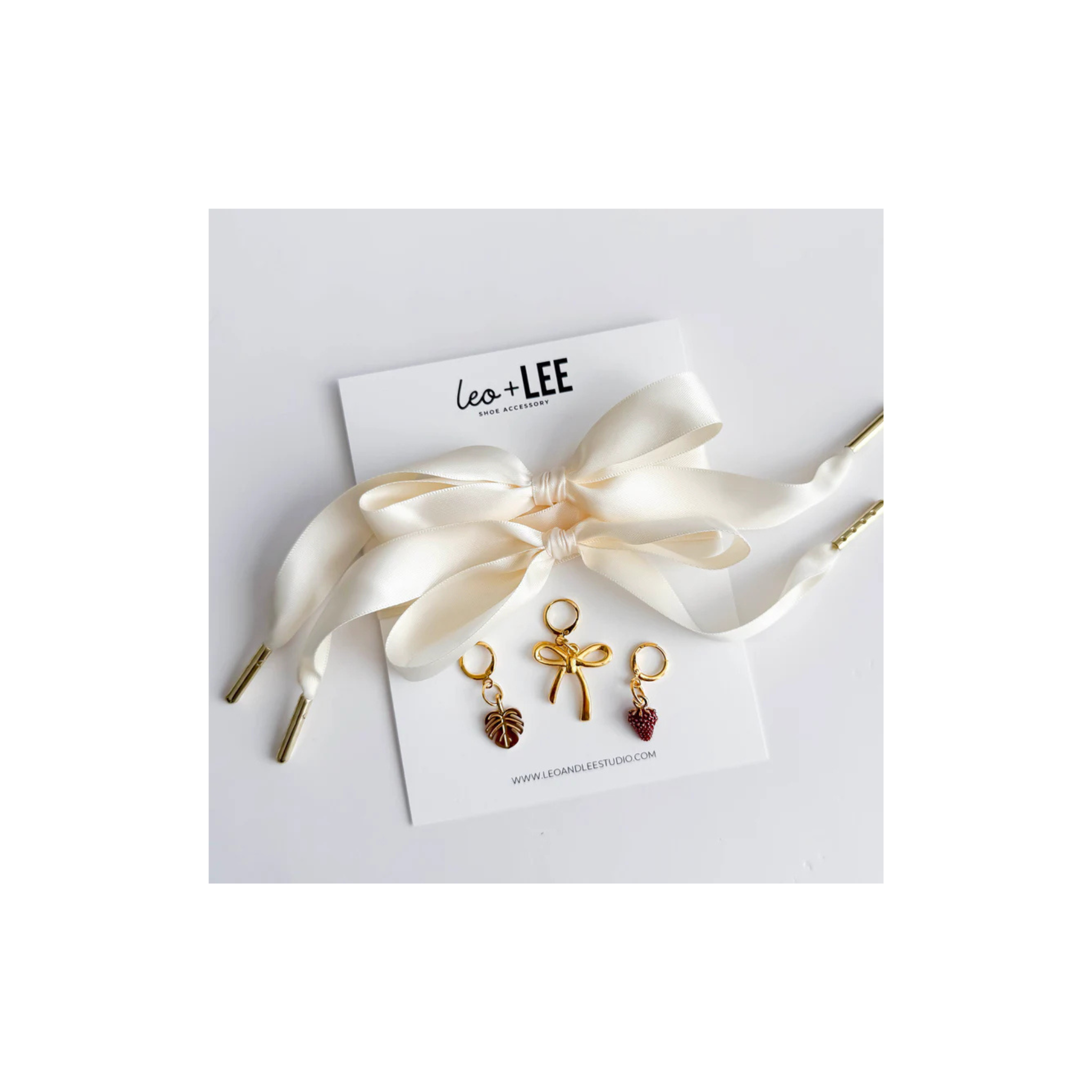 Leo + Lee Cream Satin Shoelaces & Charm Set (Fern, Bow, Strawberry)